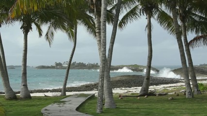 Bad weather along the coast of paradise with waves crashing along the coast of the Bahamas.
