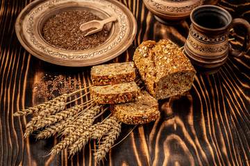 Gluten free food. Various bread with seeds of goji berry on wooden background from top view. Healthy and diet concept