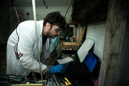 a scientist in a bunker in post-apocalypse