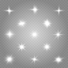 A set of bright beautiful stars. Light effect. Bright Star. Beautiful light for illustration. Christmas star.White sparkles shine special light effect. Vector sparkles on a transparent background