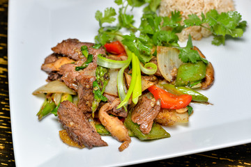 grilled meat with vegetables on white background