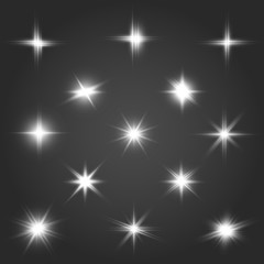 A set of bright beautiful stars. Light effect. Bright Star. Beautiful light for illustration. Christmas star.White sparkles shine special light effect. Vector sparkles on a transparent background