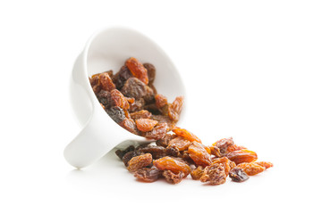 Dried raisins in bowl.