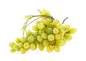 Bunch of yellow grapes with leaves isolated on white background