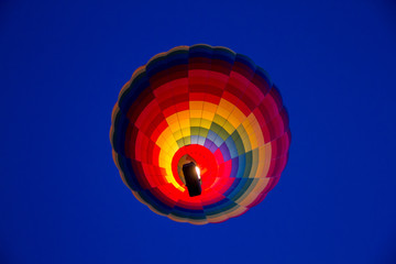 close up of a hot air balloon in mid air in capdocia