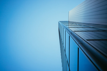 Modern skyscraper out of glass and blue sky