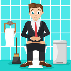 Man sitting on the toilet in the bathroom. Indigestion.