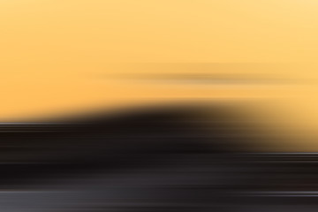 Blur or blurred abstract background suitable as a texture or wallpaper