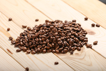 coffee beans on wooden background
