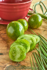 Green Heirloom Tomato on barnboards farm to table