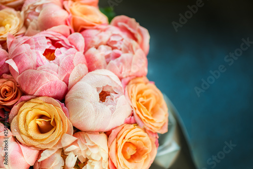 Fresh bunch of pink peonies and roses