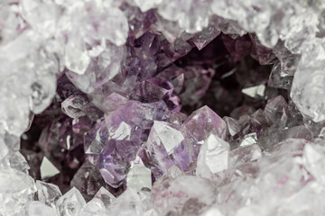 detailed view into the crystals of an amethyst geode