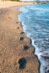 footprints on a beach