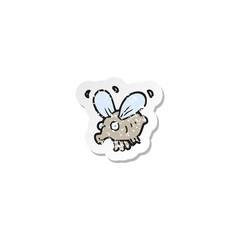 retro distressed sticker of a cartoon fly