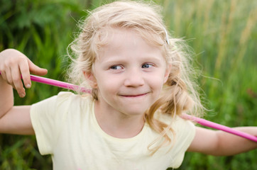 little child catching butterflies