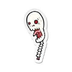 retro distressed sticker of a funny cartoon skull