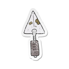retro distressed sticker of a cartoon trowel
