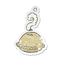 retro distressed sticker of a cartoon hot pie