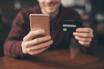 Online banking with smart phone, man rewrite a number of credit card