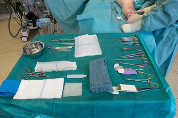 a doctor performs a surgical operation
