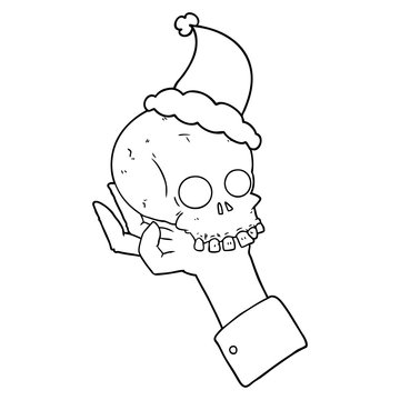 recommend clip art: line drawing of a hand holding skull wearing santa hat