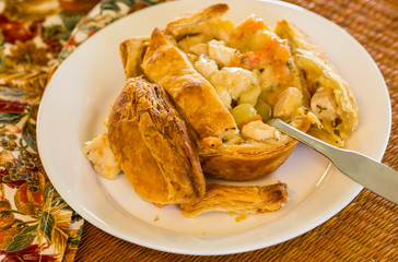 Homemade turkey pot pie in flaky; golden brown pastry.