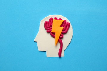 Plasticine head and brain concept. Smart mind, neurology knowledge.