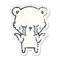 Obraz premium distressed sticker of a crying cartoon polar bear shrugging shoulders