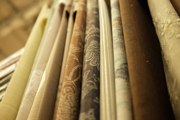 Rolls of fabric and textiles in store
