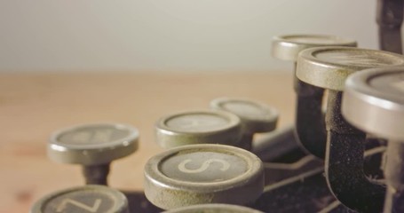 Special macro dolly shot - hovering over old typewriter keys