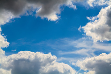 Naklejka na ściany i meble Blue sky in white clouds