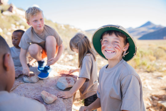 Portrait of happy boy at a camp