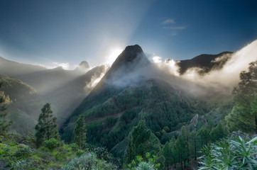 Roque Zarcita seen from the trail to La Laja towards El Cedro during sunset, with Roque de Agando...