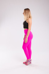 Fit women wearing sport clothes. Sportive woman wearing leggings.