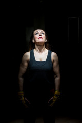 Portrait of a woman with boxing gloves