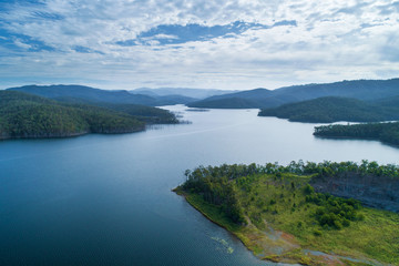 Fototapeta na wymiar Aerial view of Advancetown Lake and mountains. Advancetown, Queensland, Australia