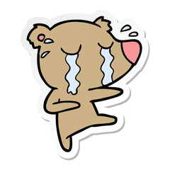 Obraz premium sticker of a cartoon crying bear