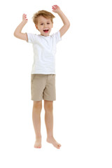 A little boy in a clean white T-shirt is jumping fun.