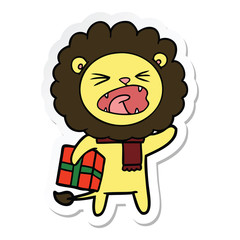sticker of a cartoon lion with christmas present