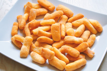 Fried dough sticks for Chuck Chuck. Close-up. Background.