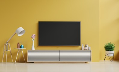 Smart TV on the yellow wall in living room and Floor lamp,minimal design,3d rendering 