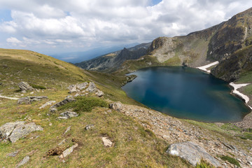 Fototapeta na wymiar Amazing landscape with The Eye lake at The Seven Rila Lakes, Rila Mountain, Bulgaria