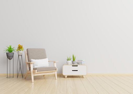 The interior has a armchair on empty white wall background,3D rendering,3d rendering © Vanit่jan
