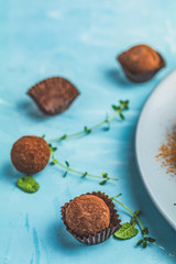Cocoa balls, handmade chocolate balls cakes in a blue tray