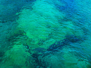 Perfect crystal clear turquoise shallow sea water