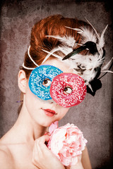 Redhead girl with Rococo hair style and donuts