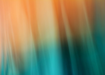 Soft and wavy blur with orange and teal tonality.