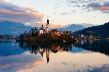 Fototapeta na wymiar Beautiful landscape of Bled Lake and Church Slovenia sunset