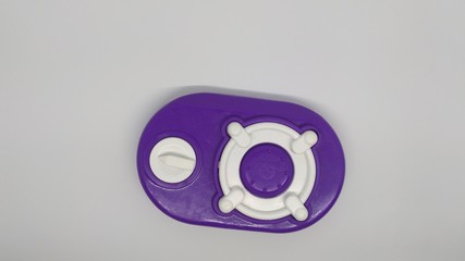 purple plastic toy stove
