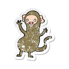 retro distressed sticker of a cartoon monkey